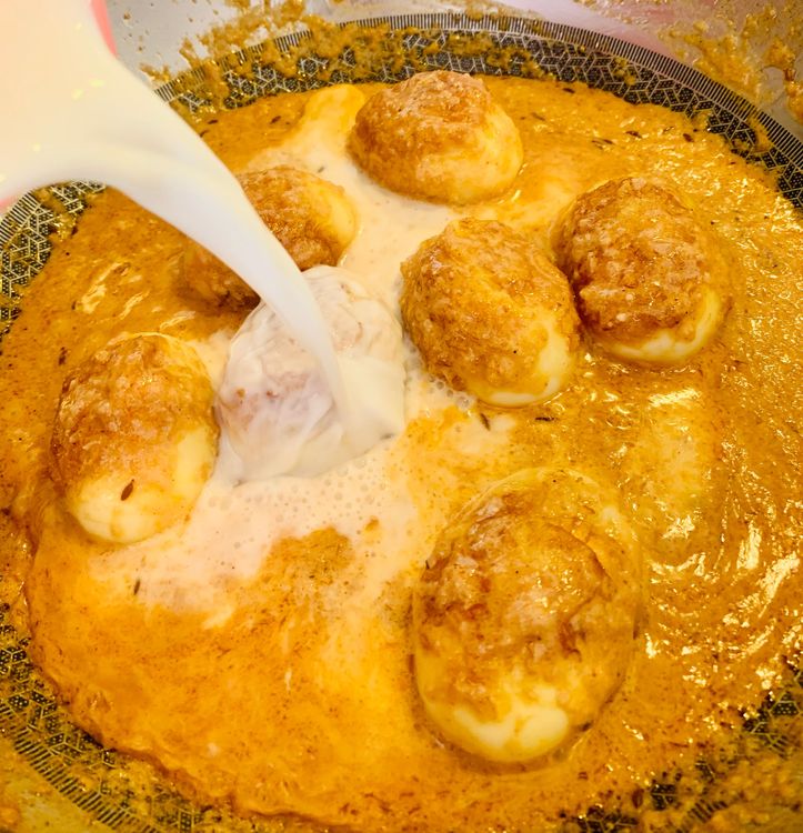 Step 1.1: Pour in the milk, stir and cover the pan for 4-5 minutes on low-medium heat, stirring occasionally