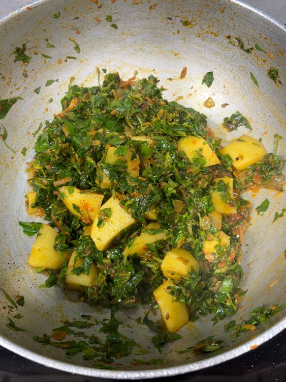 Step 3.1: Add the chopped methi leaves and mix gently