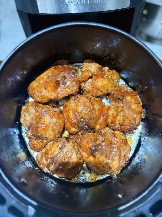 Step 3.1: After the chicken has cooked for 22 minutes, brush the marinade onto the chicken