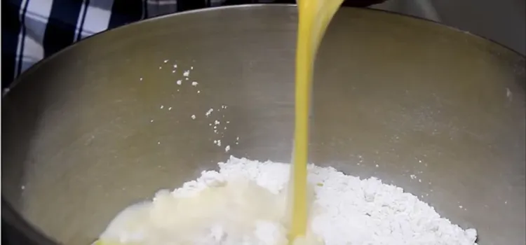 Step 1.1: Add one whole egg to the dry ingredients, then add the wet ingredients