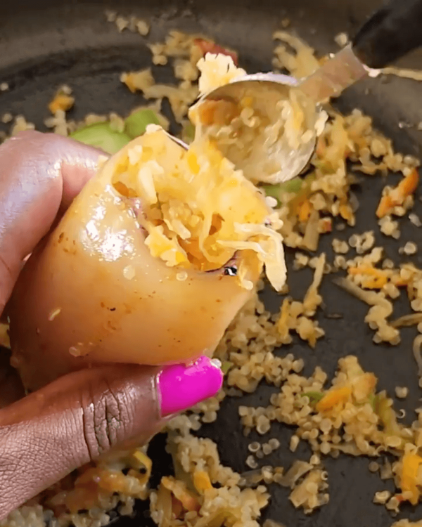 Step 2.1: Fill squid pockets 3/4 full with the quinoa mixture and secure with a toothpick