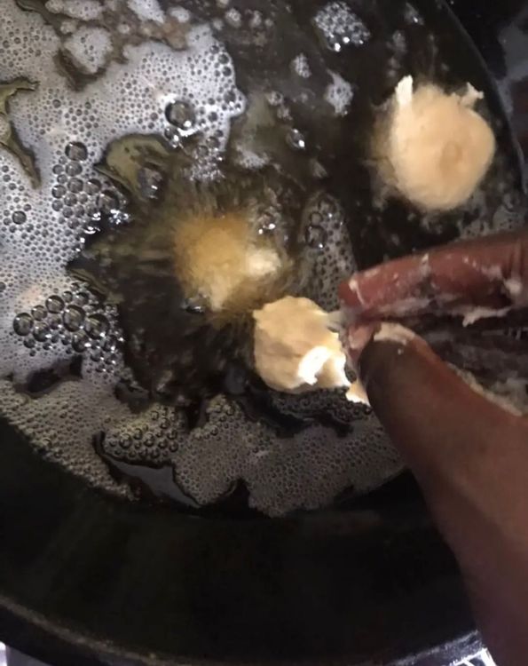 Step 1.2: Use your hands to scoop the batter and carefully place it in the hot oil