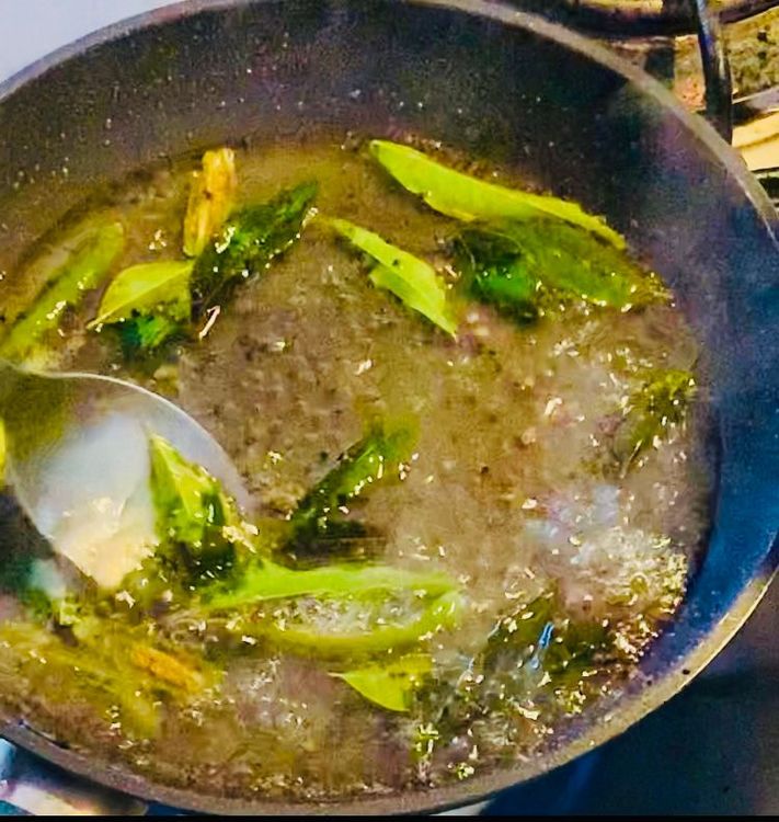 Step 2.2: Add curry leaves, green chillies, salt, water, sugar and lemon juice to the pan