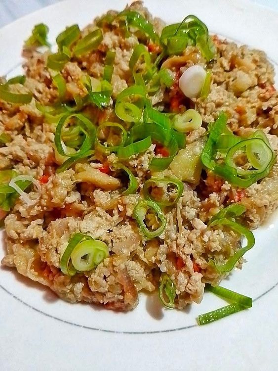 Step 1.1: Transfer to a plate and serve hot, often with rice