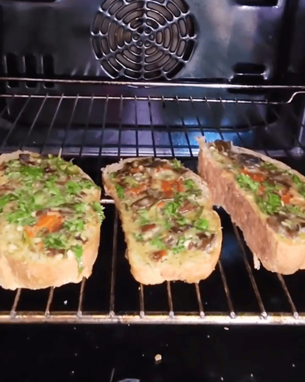 Step 1.1: Spread over sliced bread and toast in the oven
