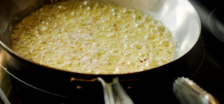 Step 1.1: Once the butter and olive oil have begun to bubble, add the garlic, shallot, and crushed red pepper flakes
