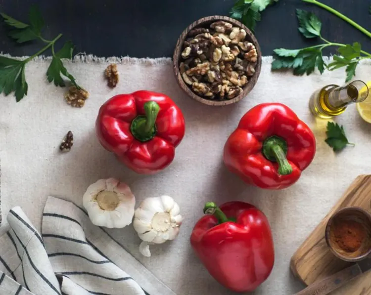 Step 1.1: Deseed and cut the red bell peppers into quarters