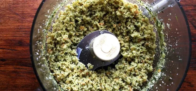 Step 3.1: Add the breadcrumbs and olive oil to the food processor, and pulse a few times to moisten the breadcrumbs