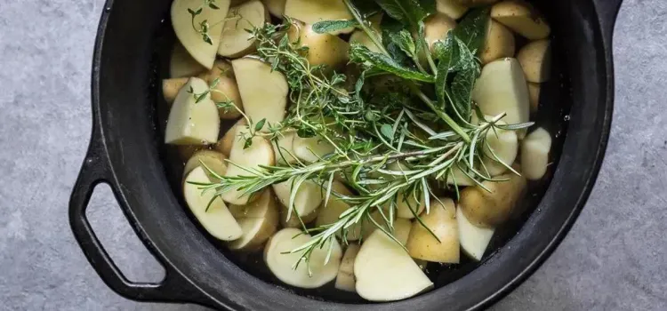 Step 1.1: Cut new potatoes in half or into four pieces if larger