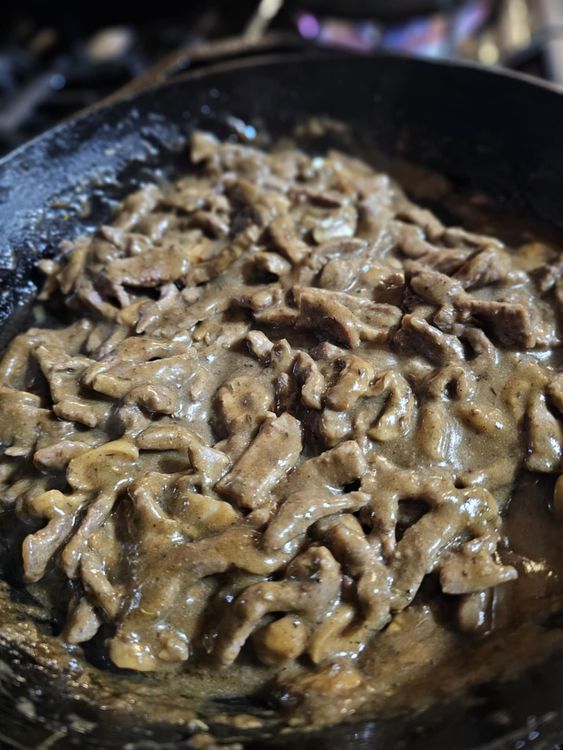 Step 1.1: Add the browned beef, (along with any juices that may have accumulated on the plate) to the pot with the sauce