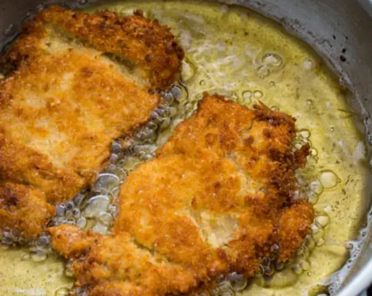 Step 2.1: Fry the chicken in small batches until golden brown, about 2 minutes on each side