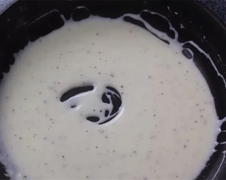 Step 1.1: Slowly pour in the milk