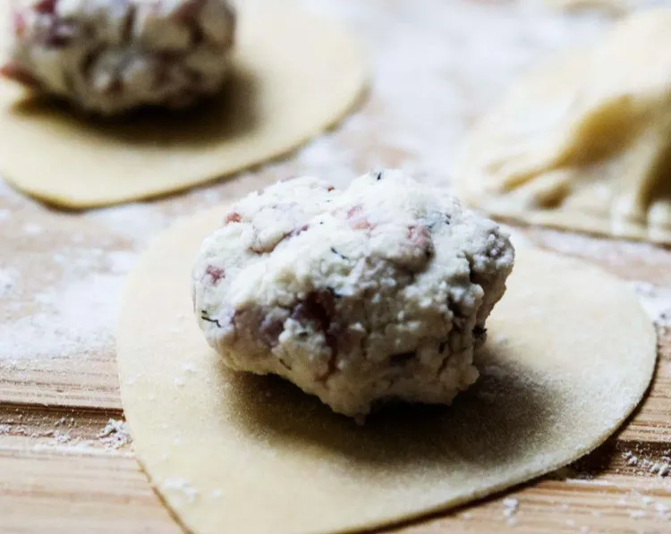 Step 3.1: In the center of half of the hearts, place a teaspoon of filling