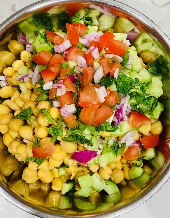 Step 1.1: Combine chickpeas, corn kernels, diced vegetables, and chopped mint leaves in a large bowl