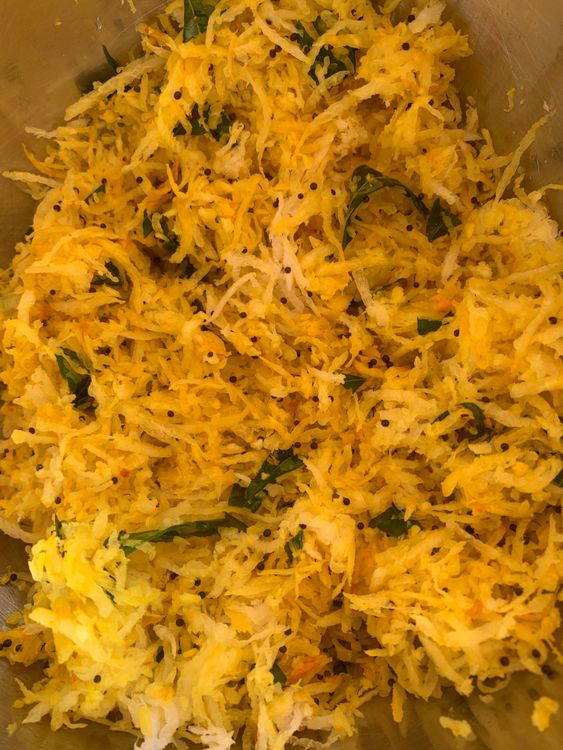 Step 2.1: Add grated radish and saute for 2-3 minutes