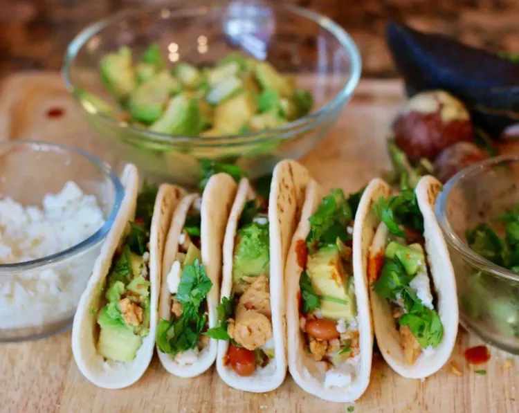 Step 3.1: Garnish with fresh cilantro, queso fresco, diced avocado, and hot sauce
