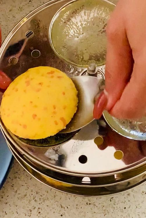 Step 1.1: Once cooked, remove the dhokla from the idli stand and let it cool for a few minutes
