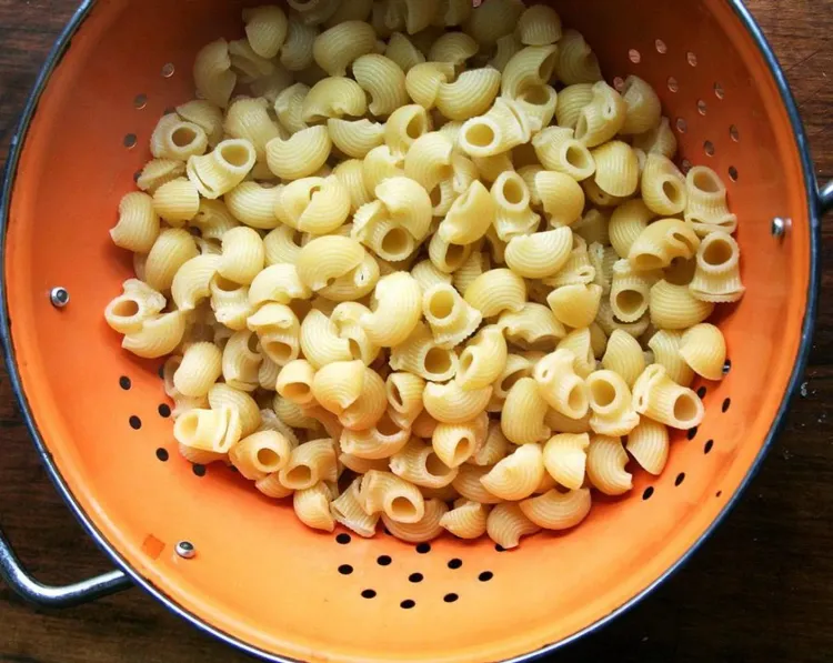 Step 1.1: Bring a large pot of heavily salted water to a boil and cook the penne pasta al dente