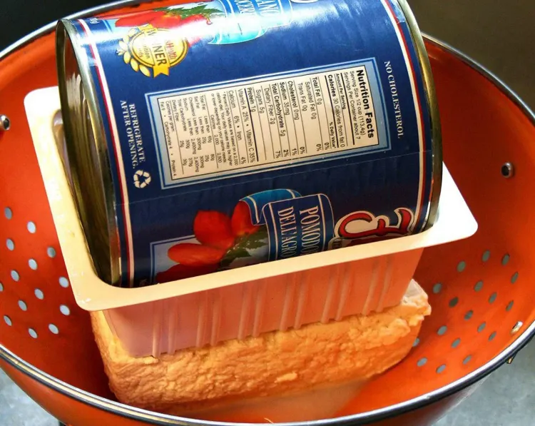 Step 1.1: Place block of tofu in a colander