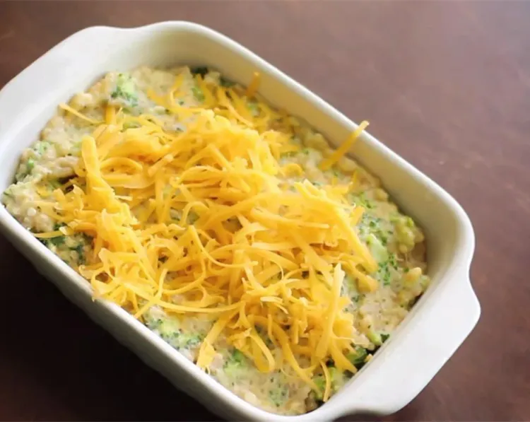 Step 1.1: Transfer to a casserole dish and cover with more cheese