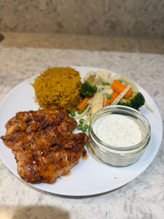 Chicken Strips with Spiced Rice and Garlic Yoghurt recipe