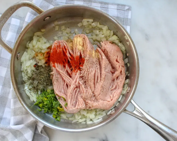 Step 1.1: In a large skillet over medium heat, sauté the chopped yellow onion in olive oil until softened, about 3-4 minutes