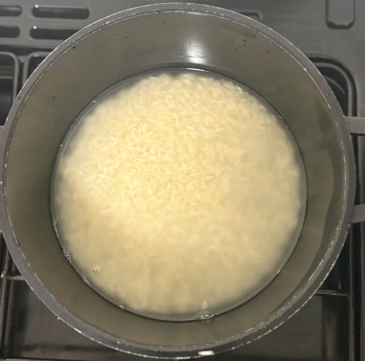 Step 3.1: Wash the rice and place it in a pot