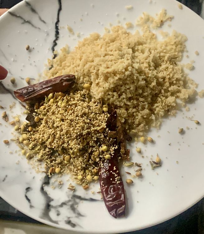 Step 1.2: In the same skillet, dry roast the cinnamon stick, peppercorns, cloves, fenugreek seeds, cumin, fennel seeds, coriander seeds, poppy seeds, and dry red chillies until fragrant