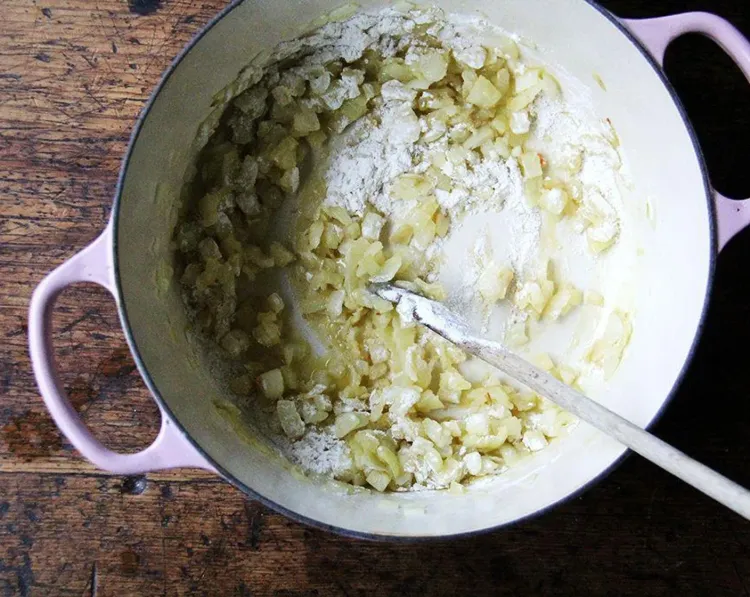 Step 2.1: Sprinkle with all-purpose flour and stir