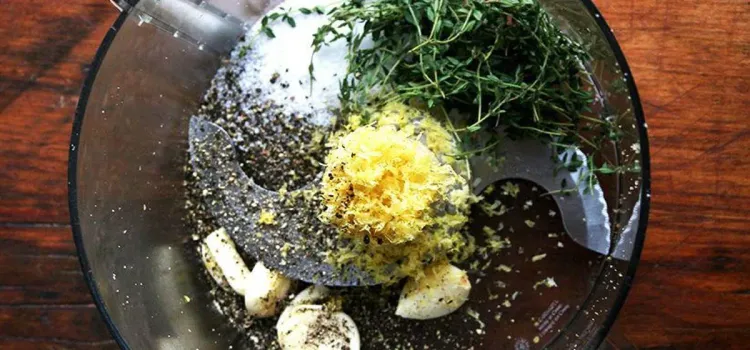 Step 2.1: Place the garlic, fresh thyme leaves, lemon zest, kosher salt, and ground black pepper in a food processor fitted with the steel blade