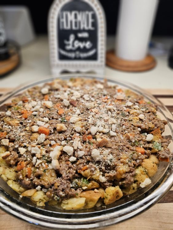 Step 1.2: Spoon the mixture into the pie shell, garnish with sourdough breadcrumbs (optional) and bake at 350°F for 25 to 30 minutes, or until heated through