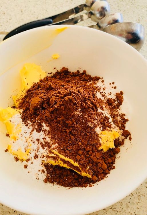 Step 1.1: Mix the icing sugar, cocoa powder, and butter in a separate bowl until smooth and soft