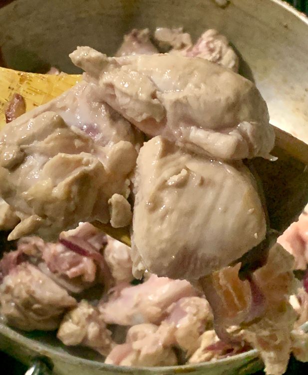 Step 2.2: Mix the chicken pieces well on high heat and cook until the chicken lightens its colour