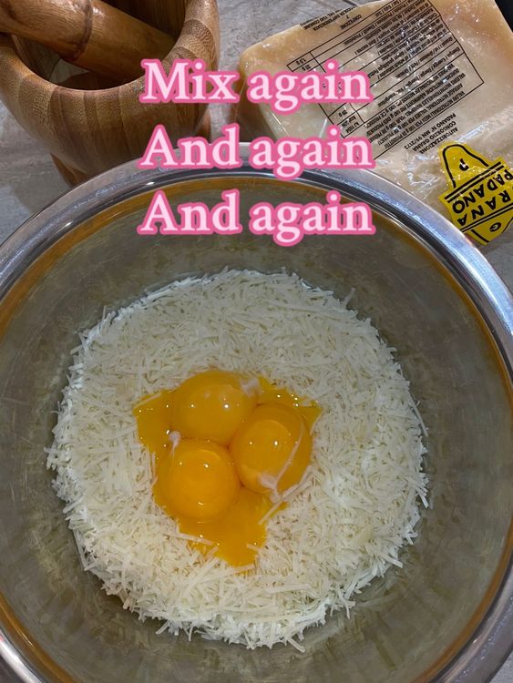Step 2.1: Add grated parmesan and mix until it becomes a creamy mass