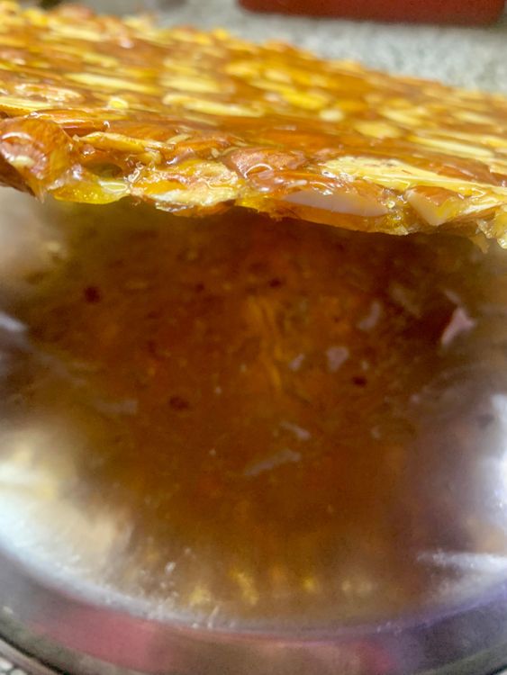 Step 1.2: Remove the layer from the plate/board with the help of a flat ladle or knife