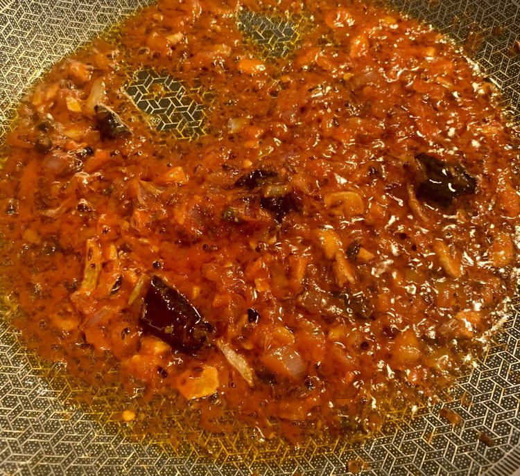 Step 2.1: Add in the tomato and kashmiri red chilli powder
