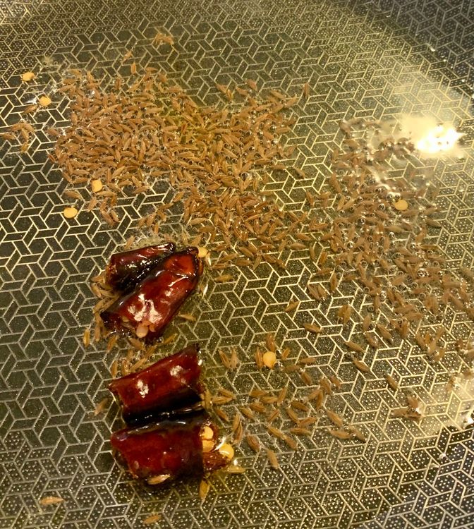 Step 2.1: Heat ghee in a deep pan on medium flame