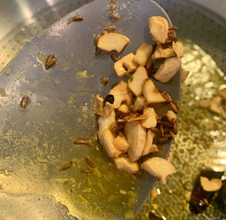 Step 2.1: Add the chopped garlic and saute for a minute