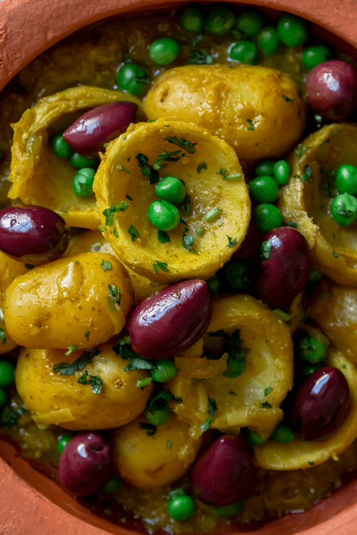 Step 1.1: Add the potatoes, artichoke bottoms, and preserved lemon to the casserole