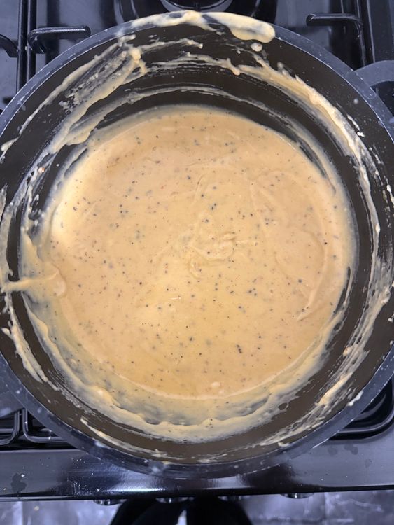 Step 1.1: Add Cajun seasoning, garlic powder, onion powder, black pepper, and salt to the sauce