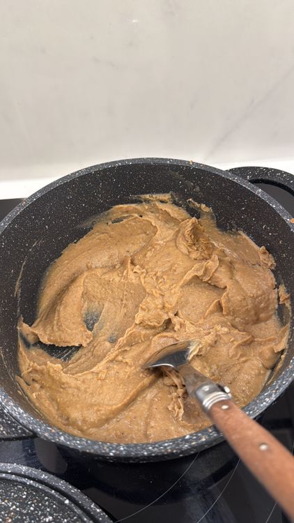 Step 1.1: Cook the mixture slowly, stirring constantly, until it becomes slightly dry
