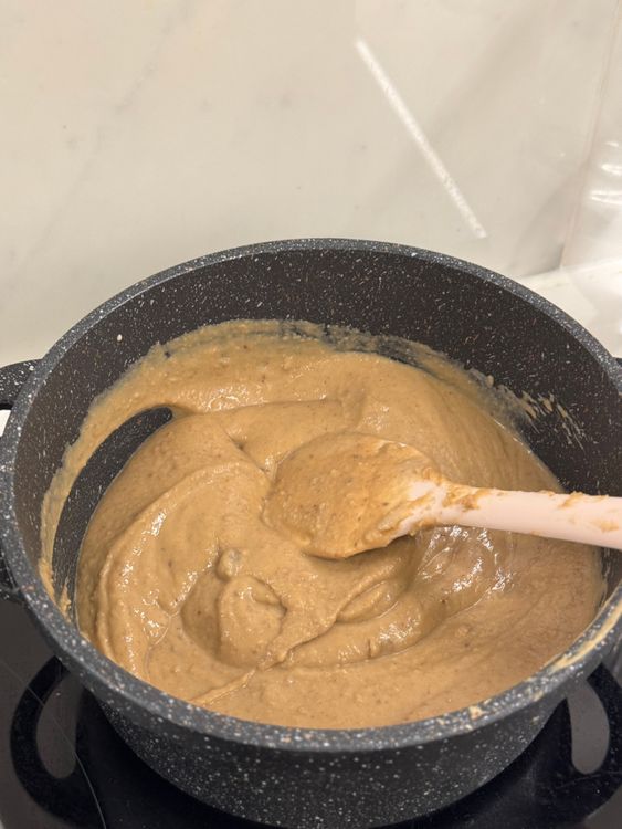 Step 4.1: Spread this whipped cream over the cake before piping the chestnut puree on top