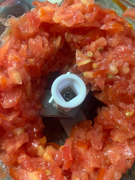 Step 1.1: Add the chopped tomatoes to the pan and cook for 3-4 minutes till they are soft
