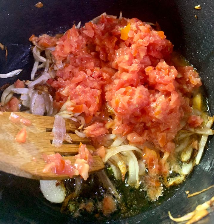 Step 1.2: Add the chopped tomatoes to the pan and cook for 3-4 minutes till they are soft