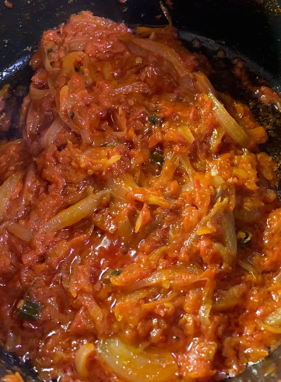 Step 1.2: Now add red chilli powder, Kashmiri red chilli powder, coriander powder and salt and mix nicely for another minute till oil separates from the mixture and leaves the sides of the pan
