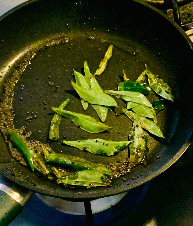 Step 2.1: Add curry leaves, green chillies, salt, water, sugar and lemon juice to the pan