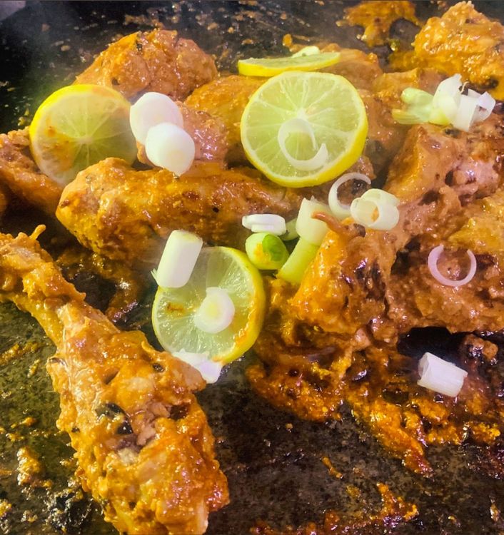 Step 2.1: Squeeze lemon wedges over the chicken, and cook for another 1-2 minutes