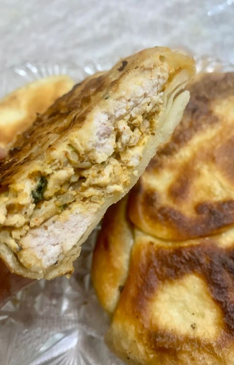 Step 3.2: Cut the baida roti into halves or squares