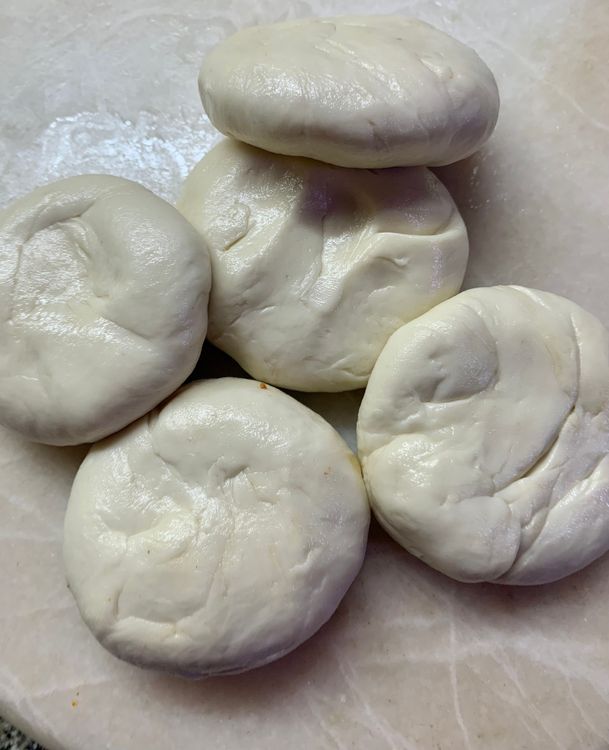 Step 3.1: Divide the dough into round equal portions and brush them  with oil and keep aside