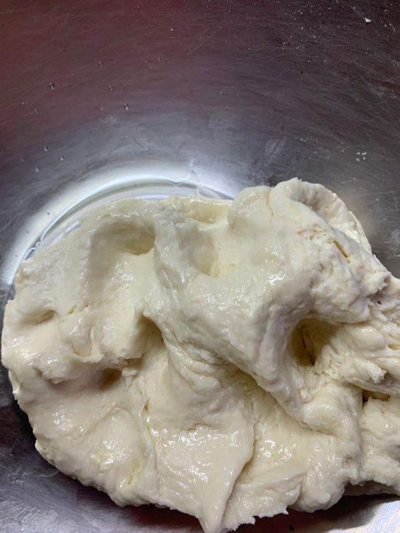 Step 1.1: Pour 1 tbsp of oil on the dough